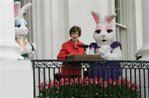 First lady Laura Bush, flanked by Easter bunnies during the annual White House Easter