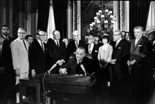 LBJ signing one of the Civil Rights Bills of the 1960s.