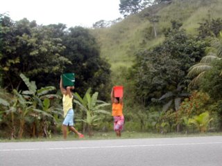 women carrying water for cooking and cleaning