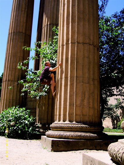 Joel climbing the pillars