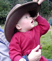 The Kid aged 6 months.  Bono is trying to steal his hat