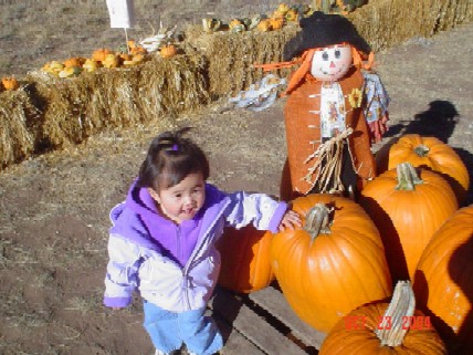 Kaleigh in the pumpkin patch.