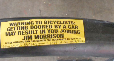 Image of sticker on bike rack at Rainbow Grocery in San Francisco