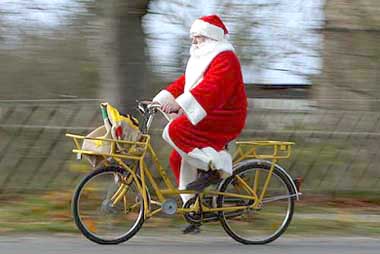 Image of Santa Claus on a bicycle