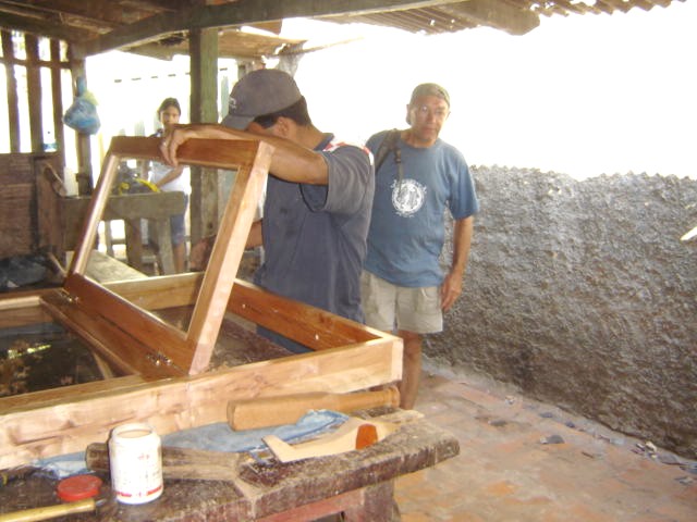 Viewing the first window at the local carpenters' shop