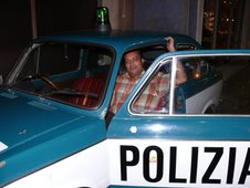 Me inside an an Italian police car...