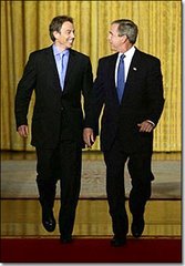 Bush & Blair are in love .