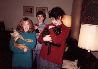 With Mergie (my cat who recently died at 23)